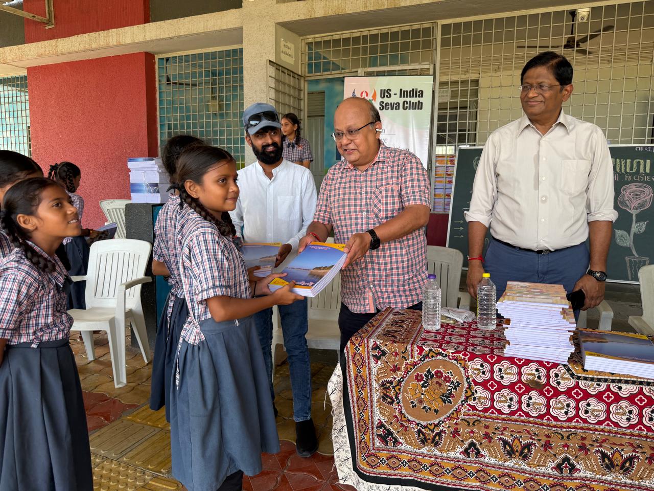 Notebook distribution at Bhadrva Kanya Shala